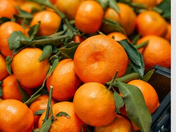 Mandarinen in Kisten | © Getty Images/Valerii Apetroaiei