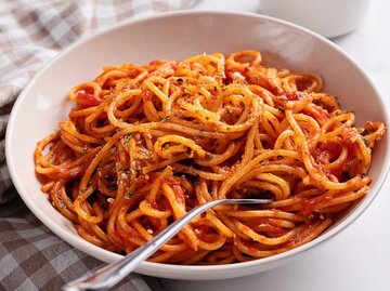 Eine Schale Spaghetti | © Getty images/Cris Cantón