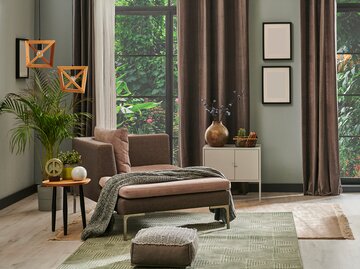 Schöne Wohnung mit grüner Wandfarbe | © AdobeStock/UnitedPhotoStudio